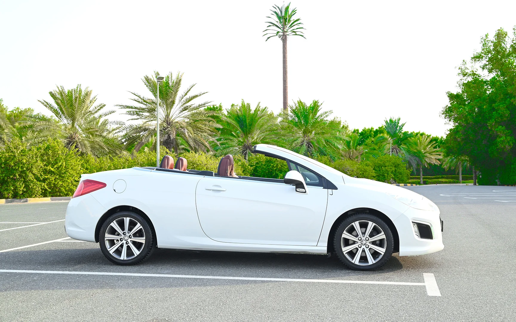 Used 2014 Peugeot 308 CC Convertible in White – Right Side View for Sale at First Choice Cars Dubai Sharjah