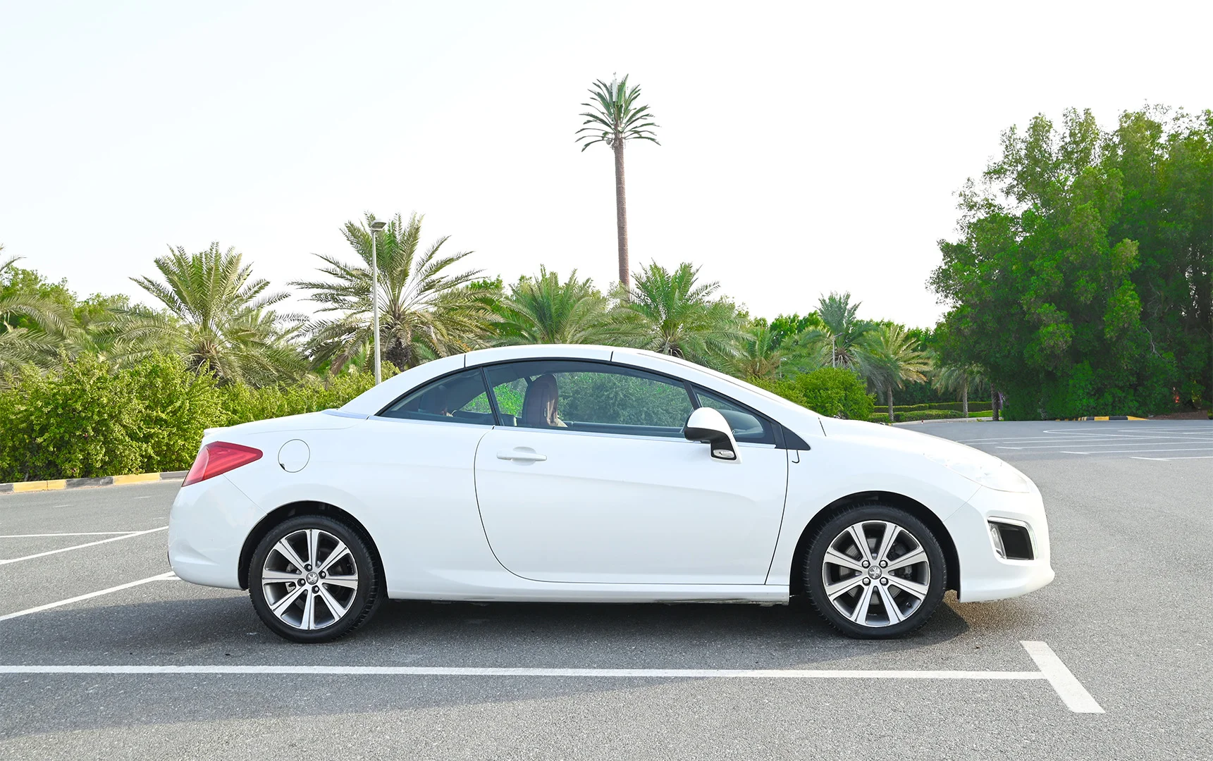 Used 2014 Peugeot 308 CC Convertible in White – Right Side View for Sale at First Choice Cars Dubai Sharjah