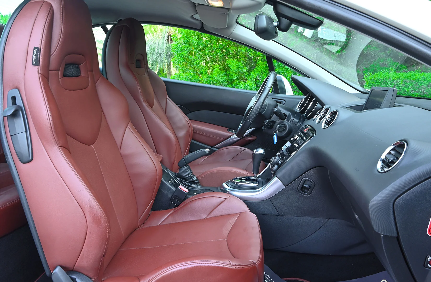 Used 2014 Peugeot 308 CC Convertible White – Front Passenger Side Cabin View at First Choice Cars Sharjah