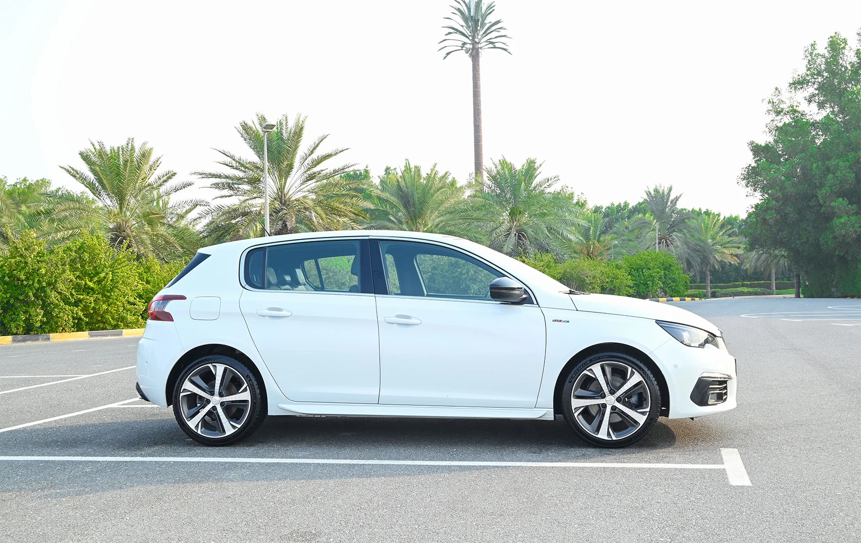 Used 2018 Peugeot 308 GT Line White – Right Side View at First Choice Cars Sharjah