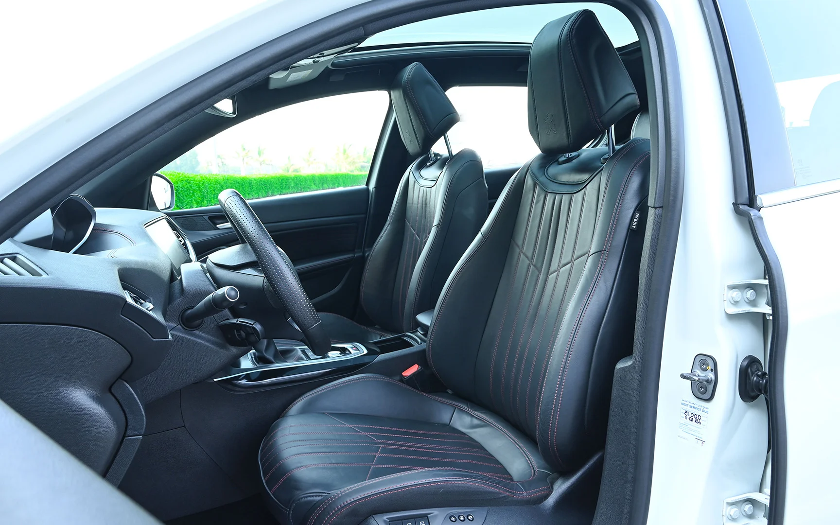 Used 2018 Peugeot 308 GT Line White – Front Driver Side Cabin View at First Choice Cars Sharjah