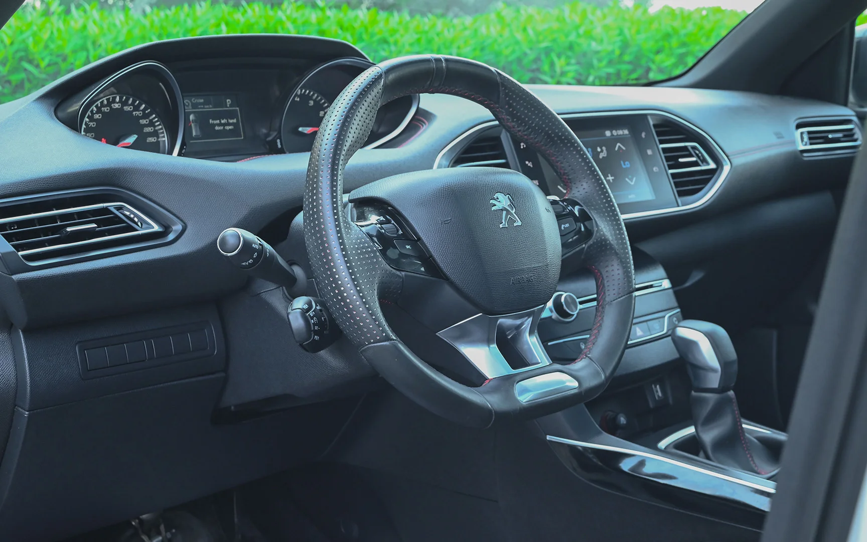 Used 2018 Peugeot 308 GT Line White – Driver Side Dashboard & Steering View at First Choice Cars Sharjah