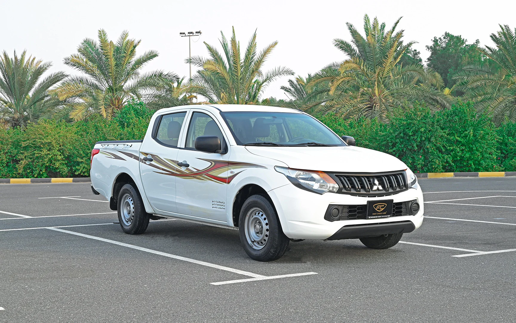 Used 2018 Mitsubishi L200 GL Double Cabin White – Right Front Diagonal (45°) View at First Choice Cars Sharjah