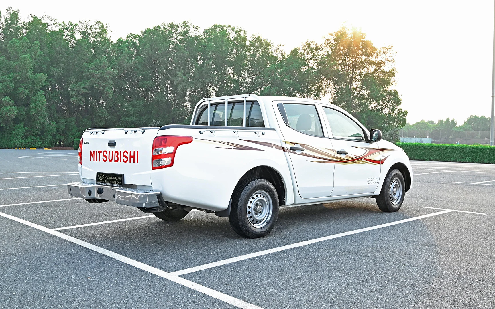 Used 2018 Mitsubishi L200 GL Double Cabin White – Right Back Diagonal (45°) View at First Choice Cars Sharjah