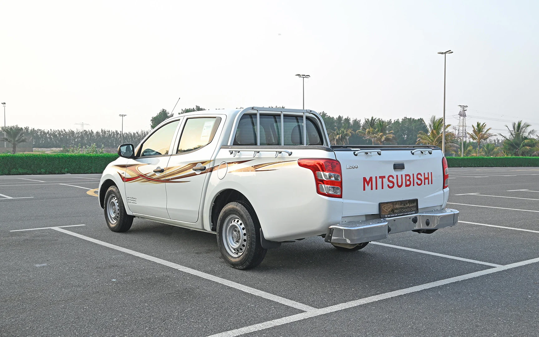 Used 2018 Mitsubishi L200 GL Double Cabin White – Left Back Diagonal (45°) View at First Choice Cars Sharjah