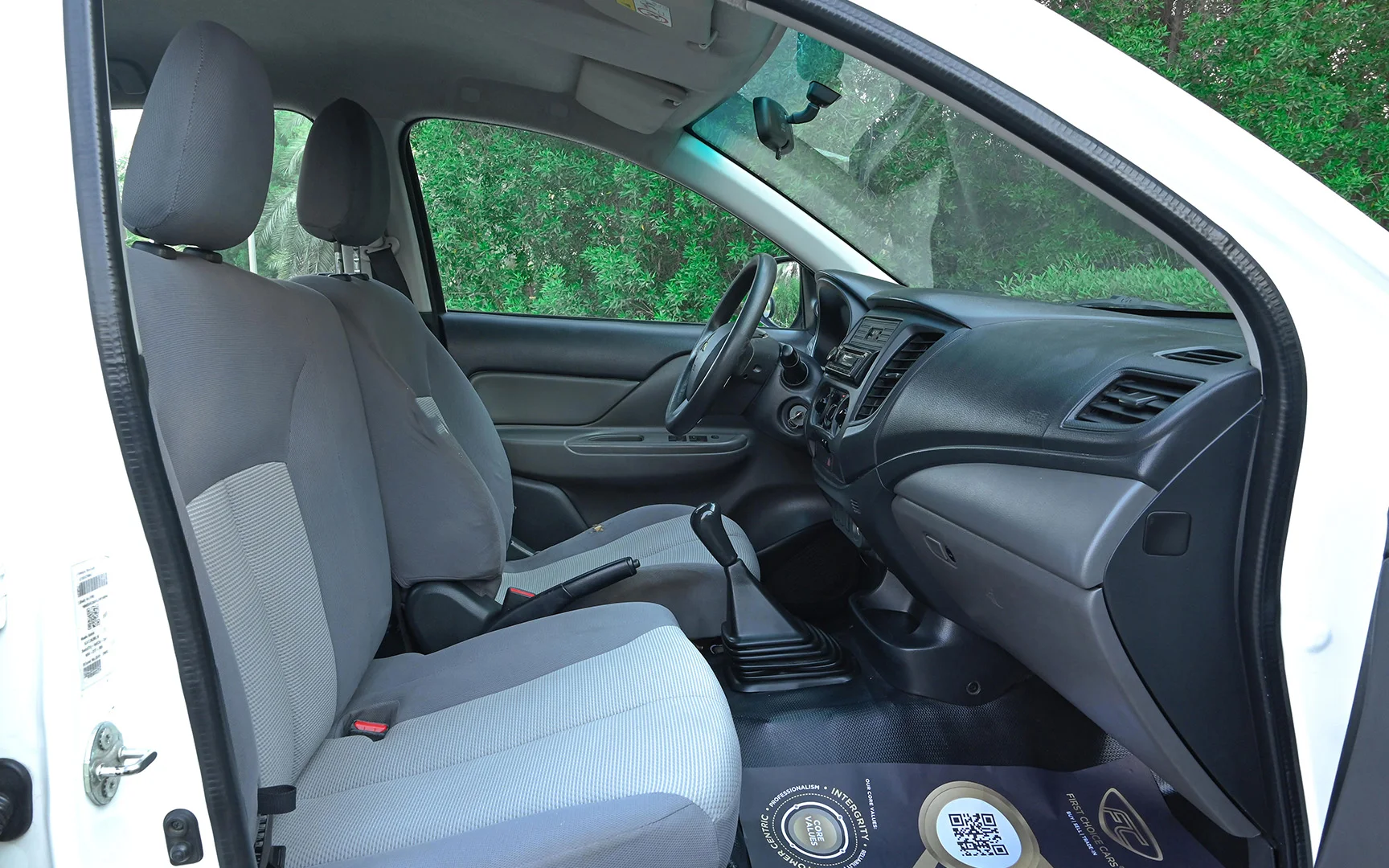 Used 2018 Mitsubishi L200 GL Double Cabin White – Front Passenger Side Cabin View at First Choice Cars Sharjah