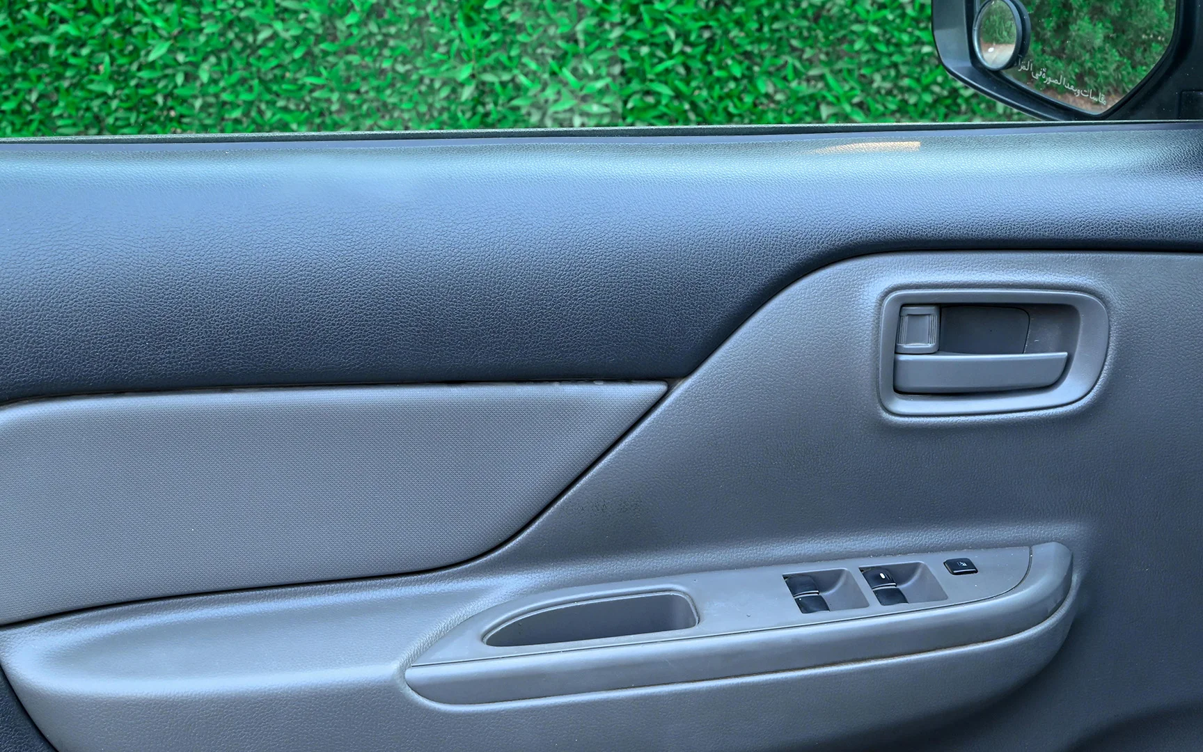 Used 2018 Mitsubishi L200 GL Double Cabin White – Driver Door Panel Full View at First Choice Cars Sharjah