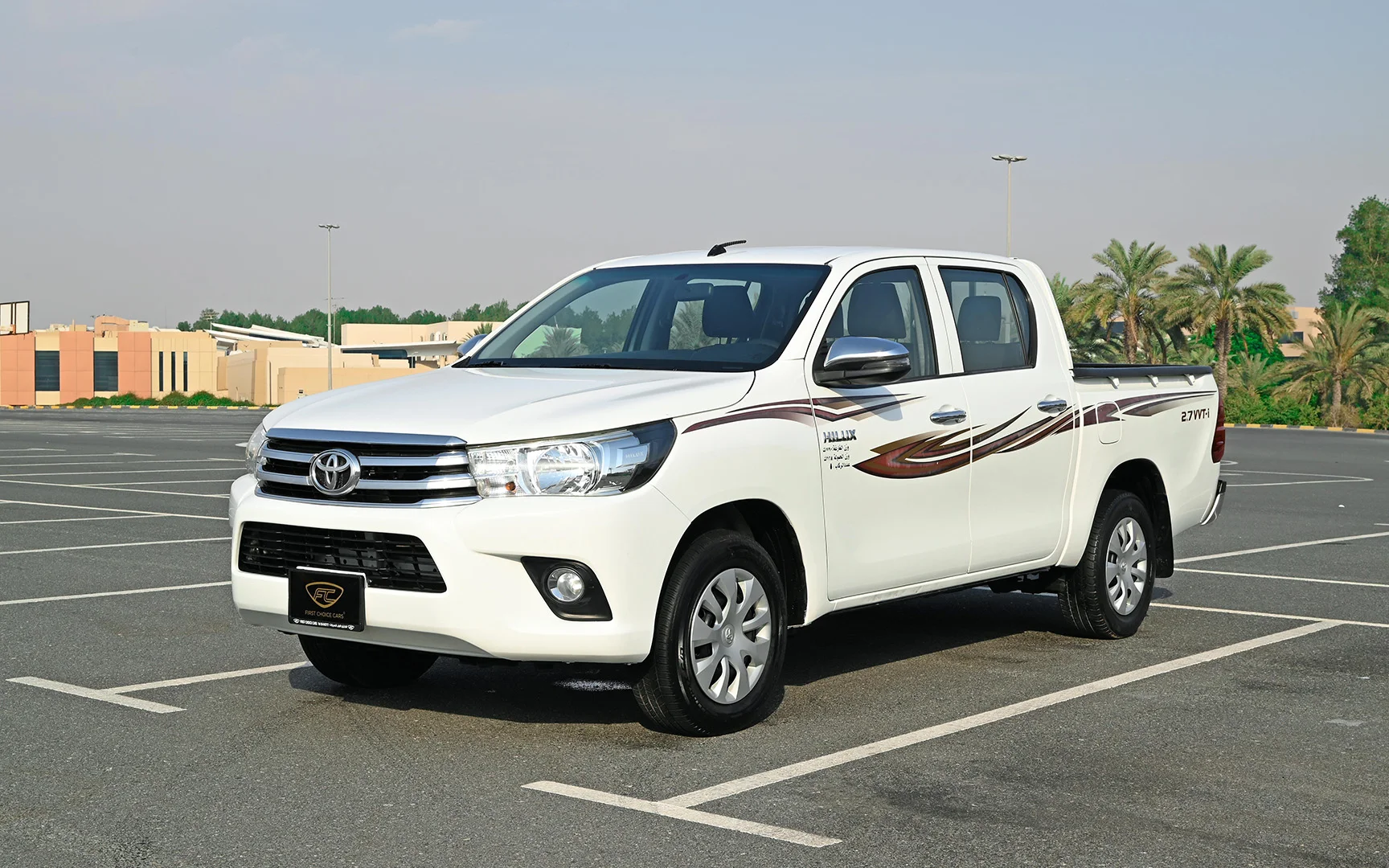Used 2018 Toyota Hilux GLX Double Cabin in White – Left Front Diagonal (45°) View for Sale at First Choice Cars Dubai Sharjah