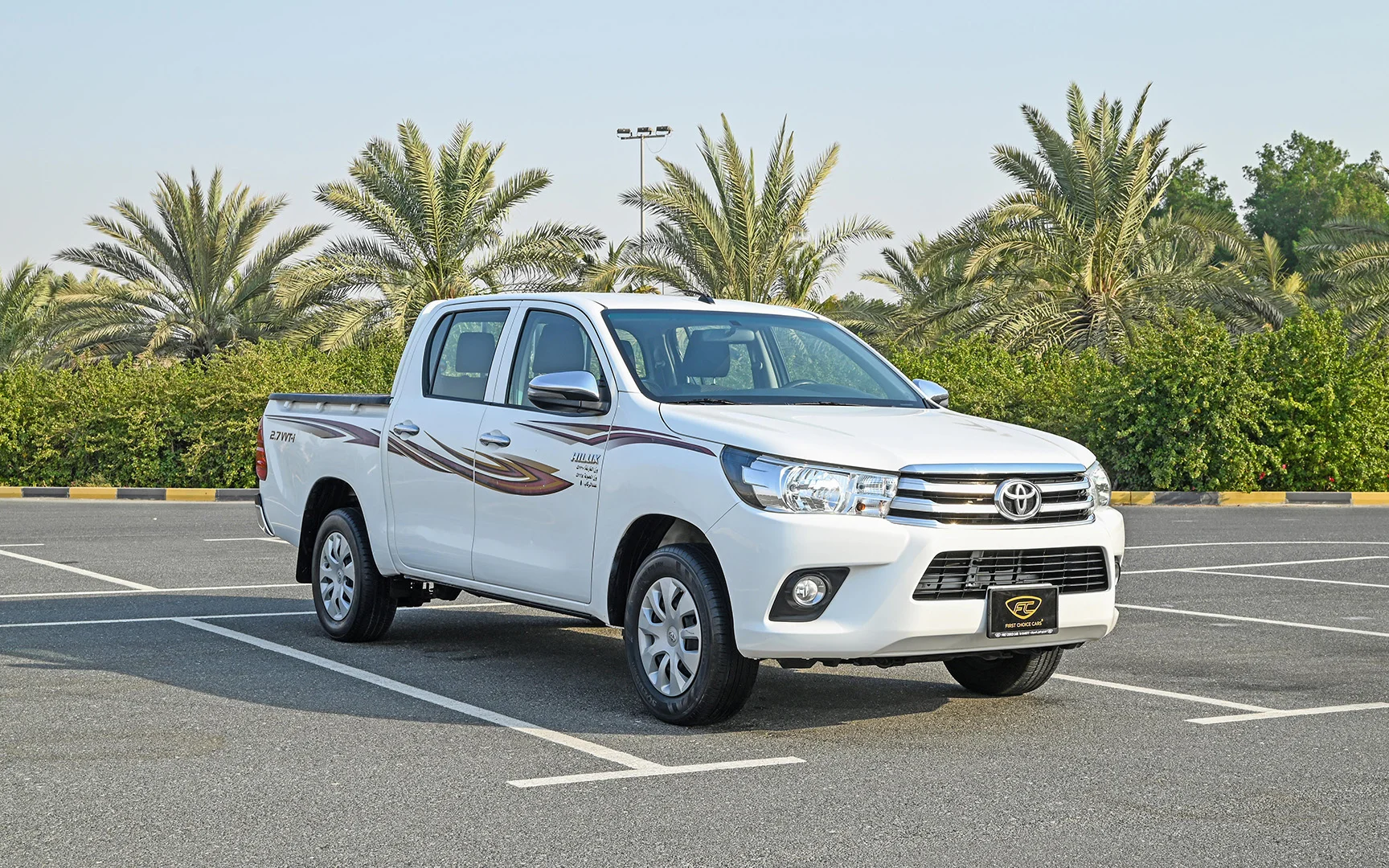 Used 2018 Toyota Hilux GLX Double Cabin in White – Right Front Diagonal (45°) View for Sale at First Choice Cars Dubai Sharjah