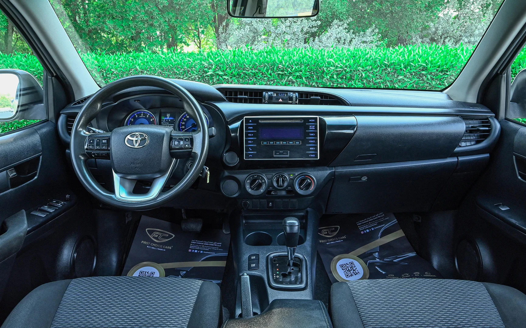 Used 2018 Toyota Hilux GLX Double Cabin White – Front Cabin / Dashboard Full View at First Choice Cars Sharjah