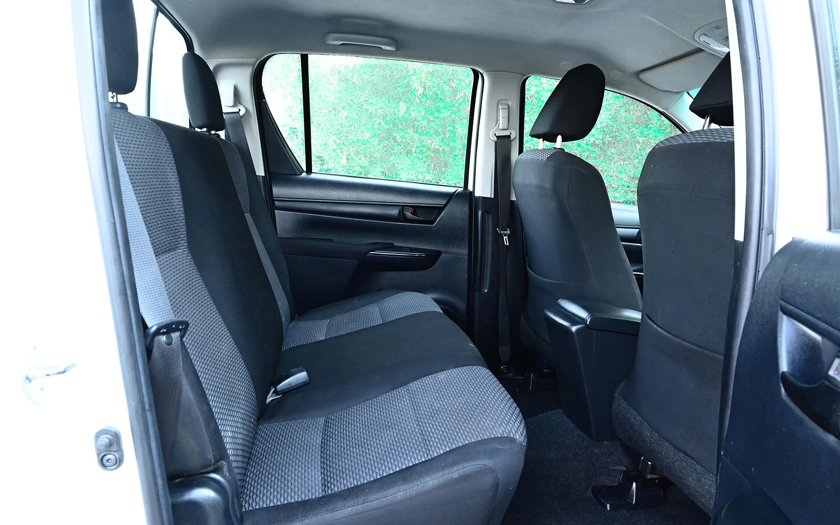 Used 2018 Toyota Hilux GLX Double Cabin White – Rear Passenger Side Cabin View at First Choice Cars Sharjah