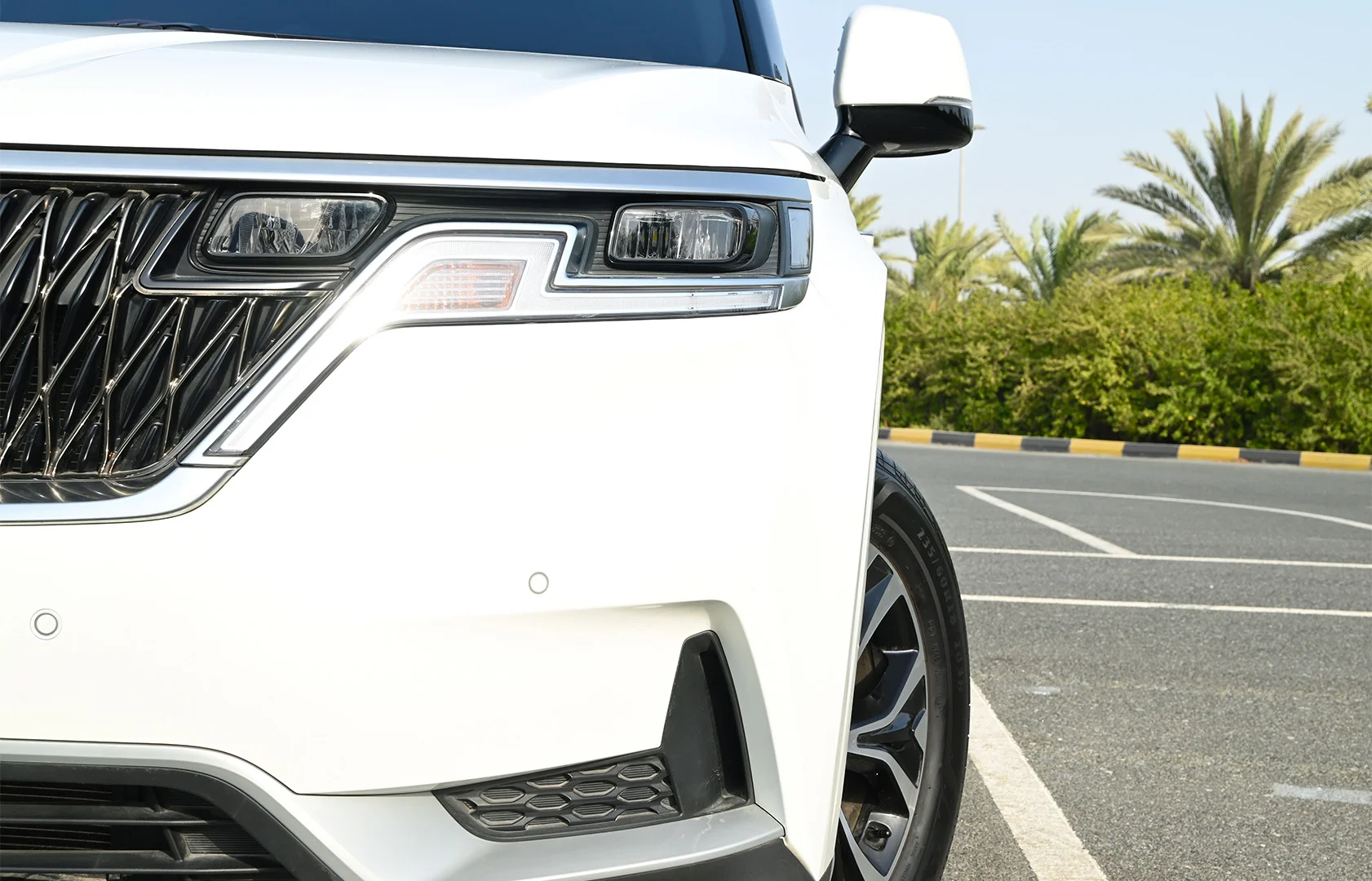 Used 2021 KIA Carnival Lx White – Headlight Close-up at First Choice Cars Sharjah