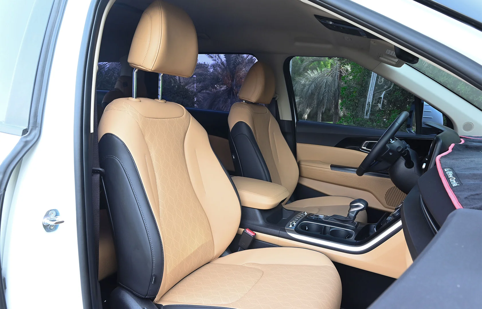 Used 2021 Kia Carnival LX in White – Front Passenger Side Cabin View for Sale at First Choice Cars Dubai Sharjah