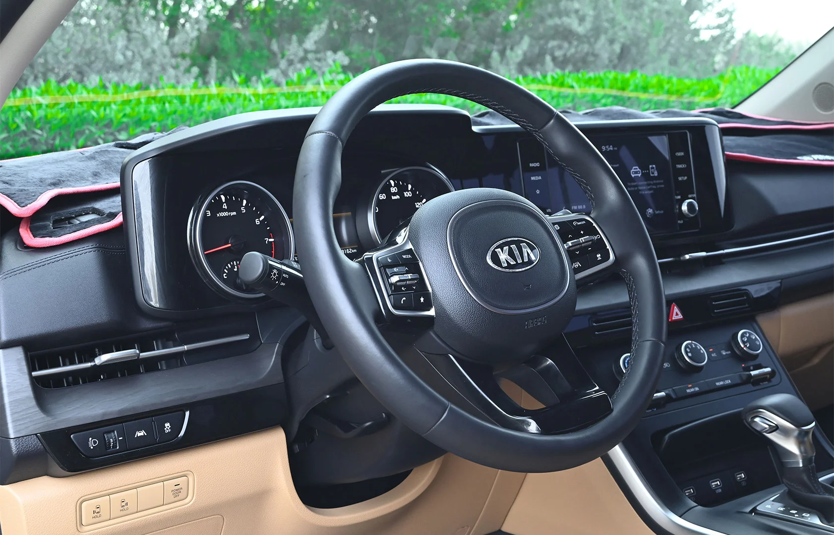 Used 2021 KIA Carnival Lx White – Driver Side Dashboard & Steering View at First Choice Cars Sharjah