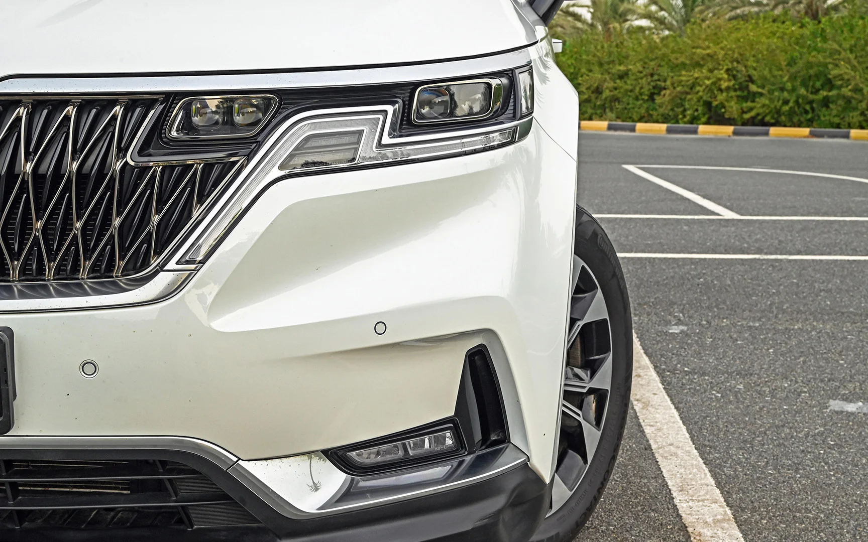 Used 2021 KIA Carnival Ex White – Headlight Close-up at First Choice Cars Sharjah