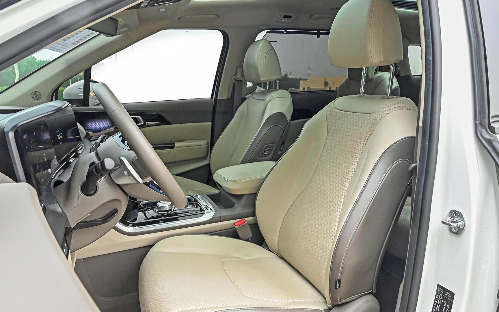 Used 2021 KIA Carnival Ex White – Front Driver Side Cabin View at First Choice Cars Sharjah