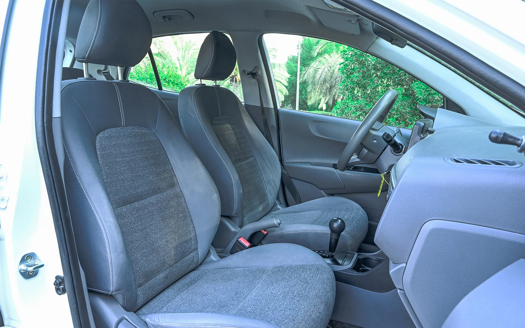 Used 2019 Kia Picanto LX in White – Front Passenger Side Cabin View for Sale at First Choice Cars Dubai Sharjah