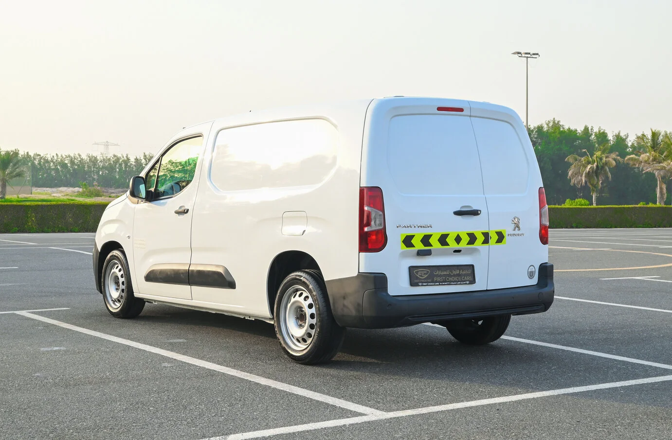 Used 2020 Peugeot Partner Long Van in White – Left Back Diagonal (45°) View for Sale at First Choice Cars Dubai Sharjah