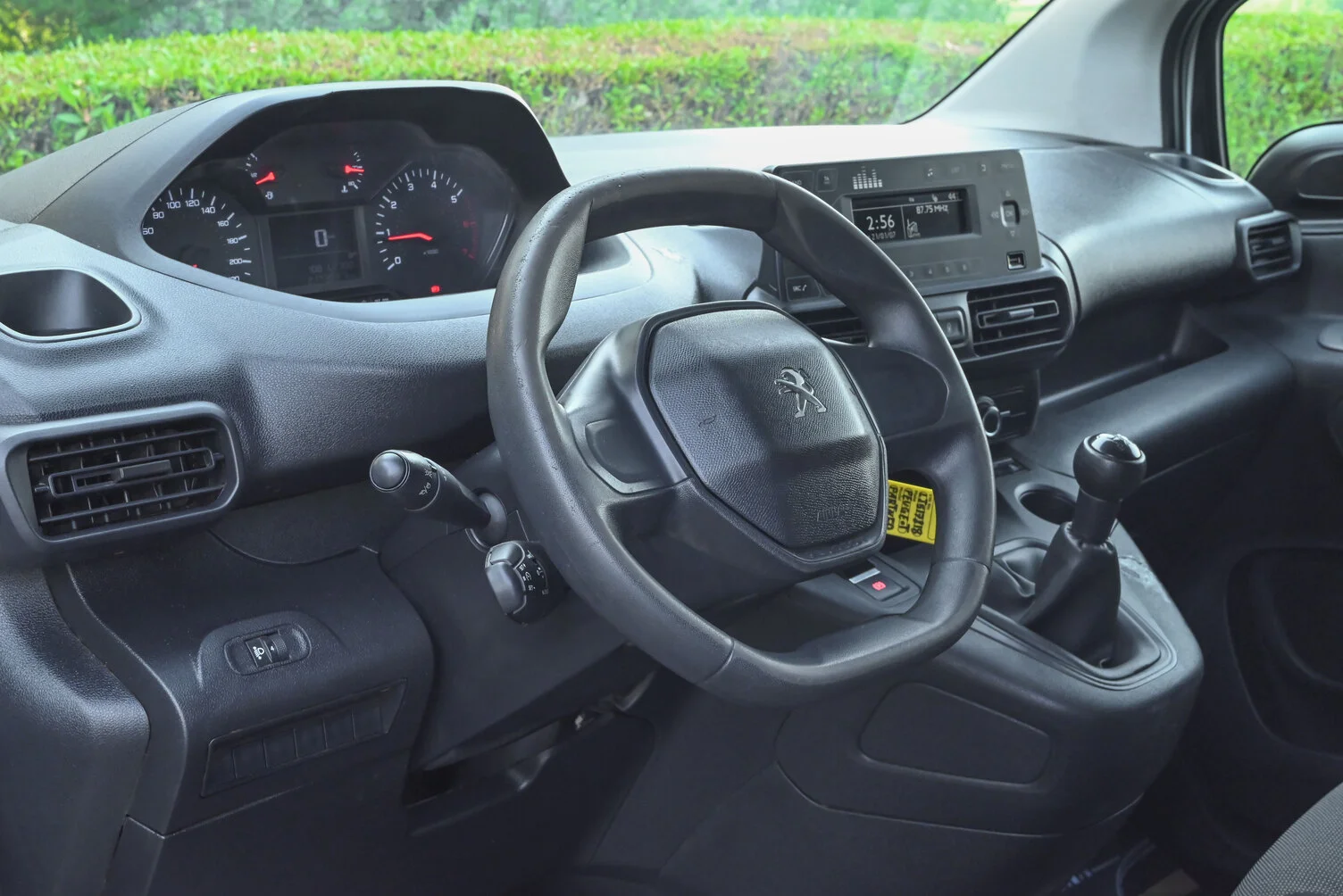 Used 2020 Peugeot Partner Long Van in White – Driver Side Dashboard & Steering View for Sale at First Choice Cars Dubai Sharjah