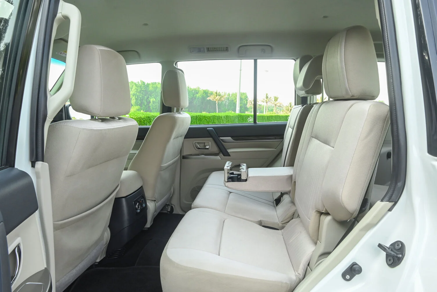 Used 2019 Mitsubishi PAJERO GLS White – Rear Driver Side Cabin View at First Choice Cars Sharjah