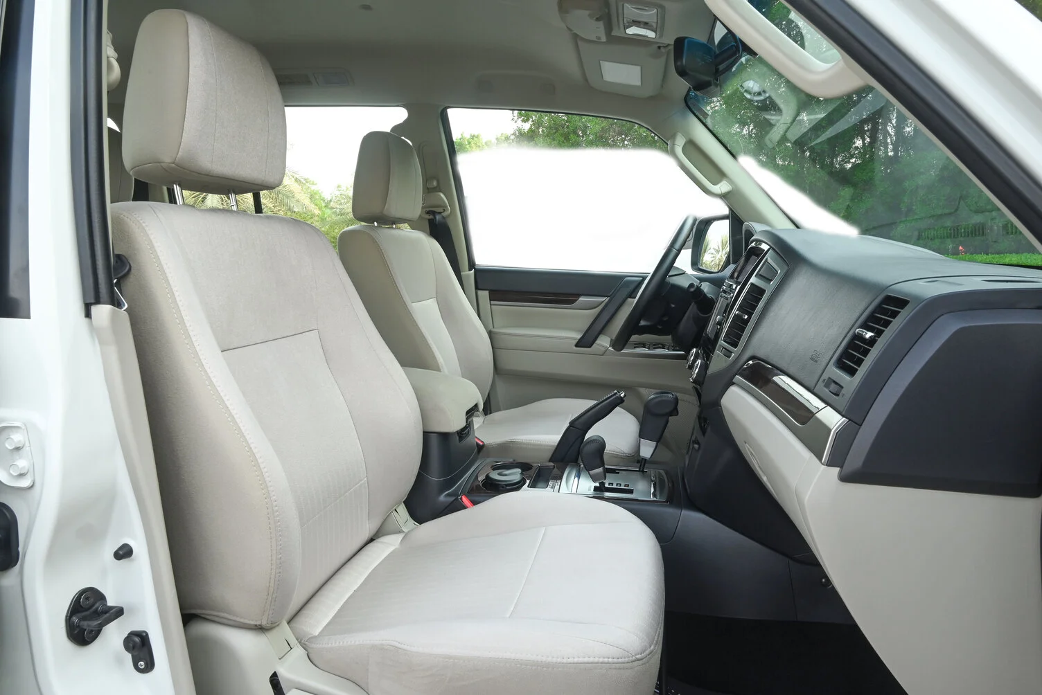 Used 2019 Mitsubishi PAJERO GLS White – Front Passenger Side Cabin View at First Choice Cars Sharjah