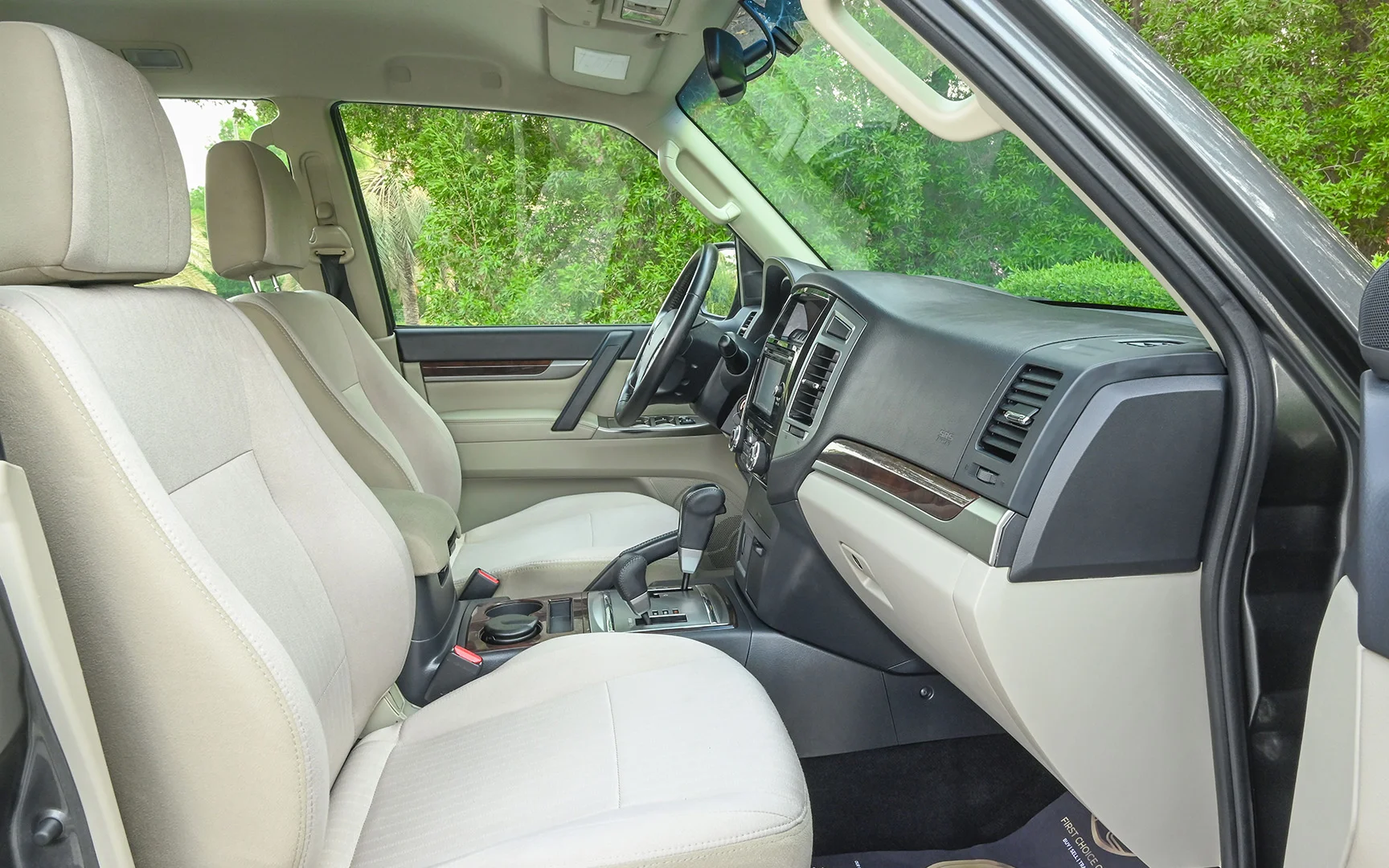 Used 2019 Mitsubishi PAJERO GLS Grey – Front Passenger Side Cabin View at First Choice Cars Sharjah