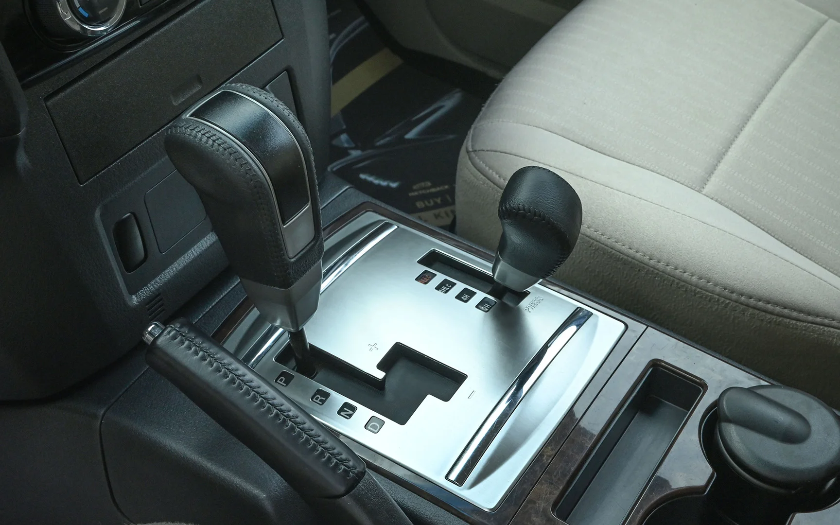 Used 2019 Mitsubishi PAJERO GLS Grey – Center Console & Gear Shifter at First Choice Cars Sharjah