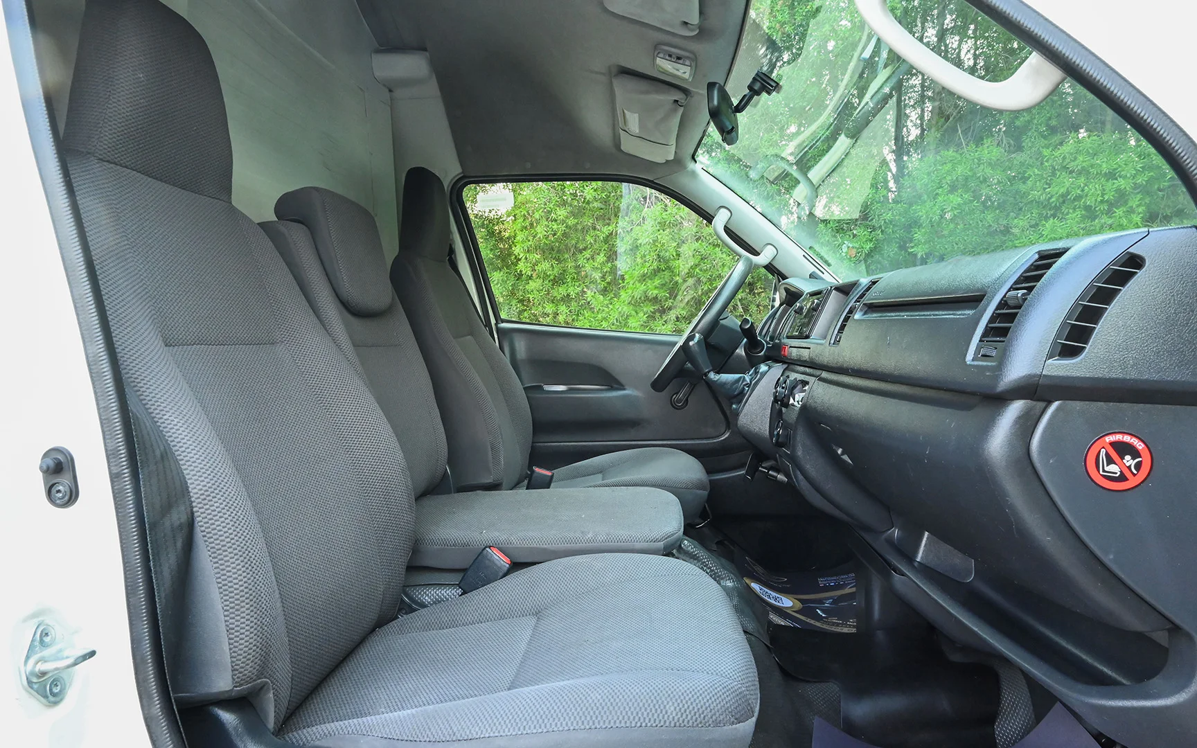 Used 2020 Toyota Hiace GL High Roof White – Front Passenger Side Cabin View at First Choice Cars Sharjah