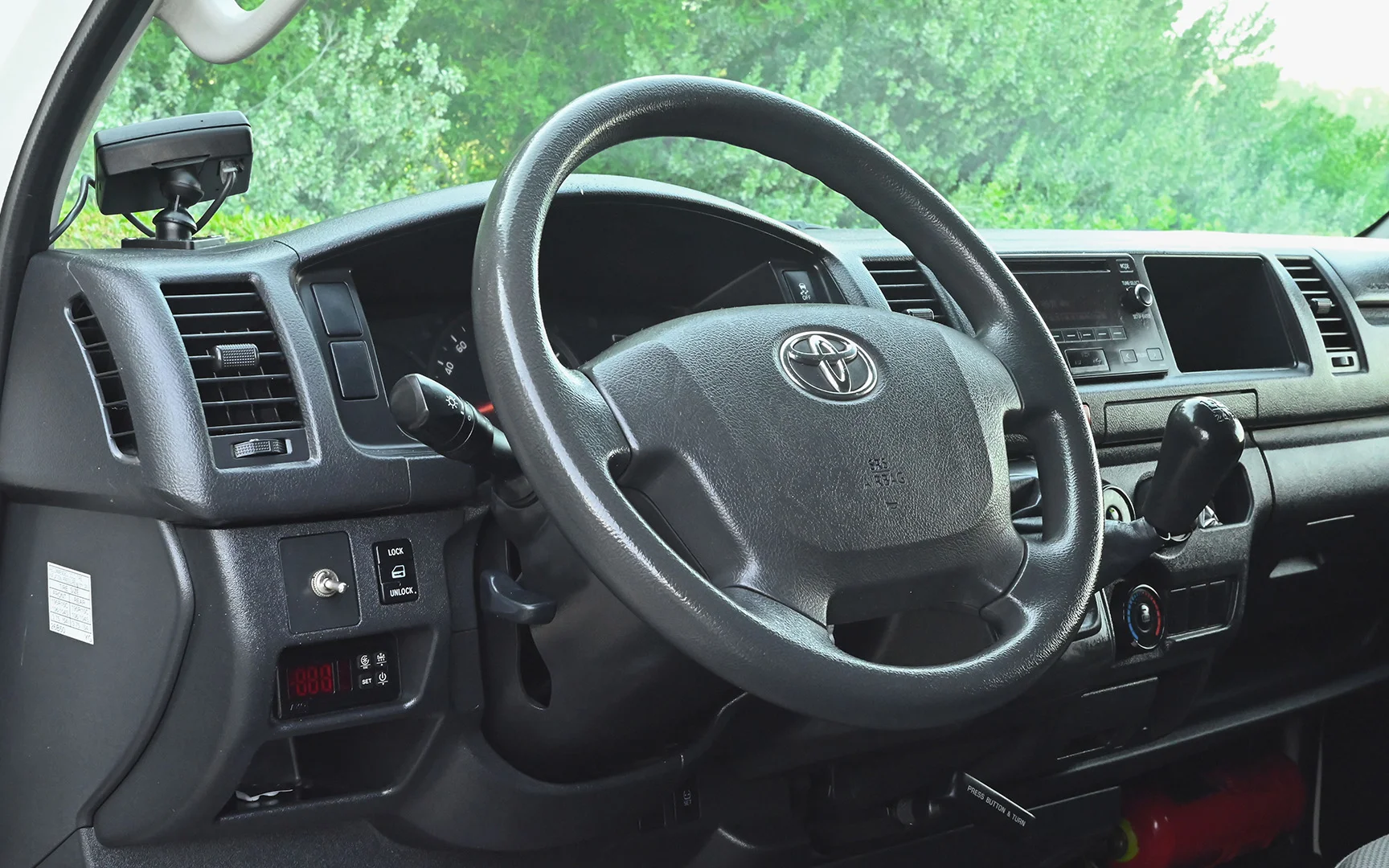 Used 2020 Toyota Hiace GL High Roof White – Driver Side Dashboard & Steering View at First Choice Cars Sharjah