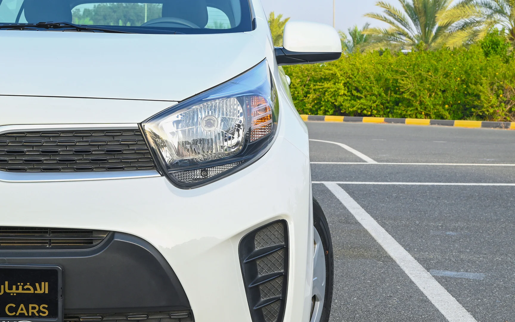 Used 2020 KIA Picanto Lx White – Headlight Close-up at First Choice Cars Sharjah