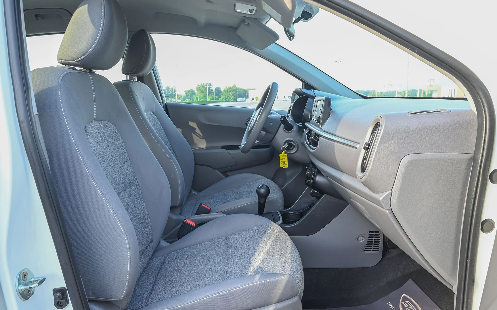 Used 2020 KIA Picanto Lx White – Front Passenger Side Cabin View at First Choice Cars Sharjah