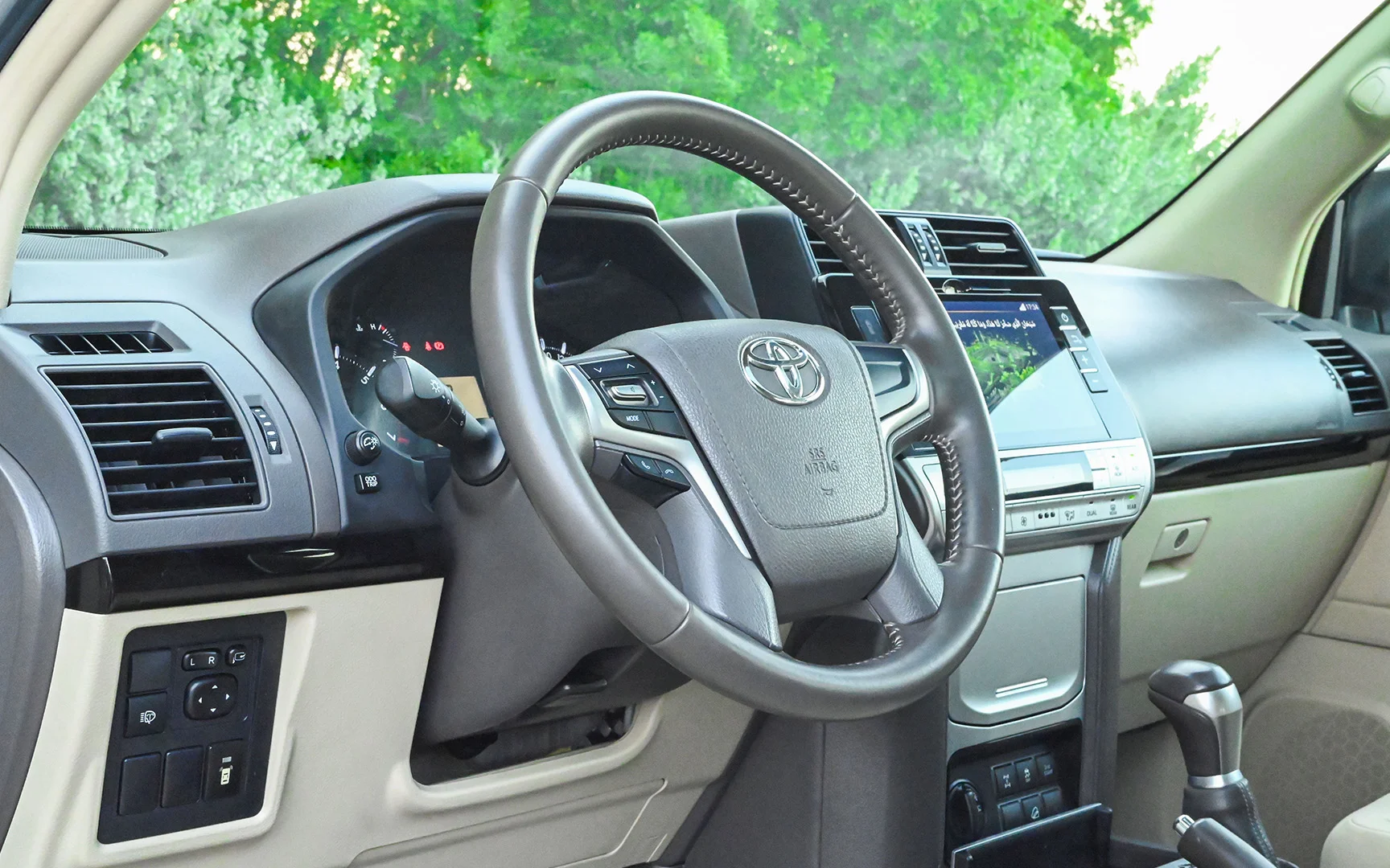 Used 2019 Toyota Prado VXR Silver – Driver Side Dashboard & Steering View at First Choice Cars Sharjah