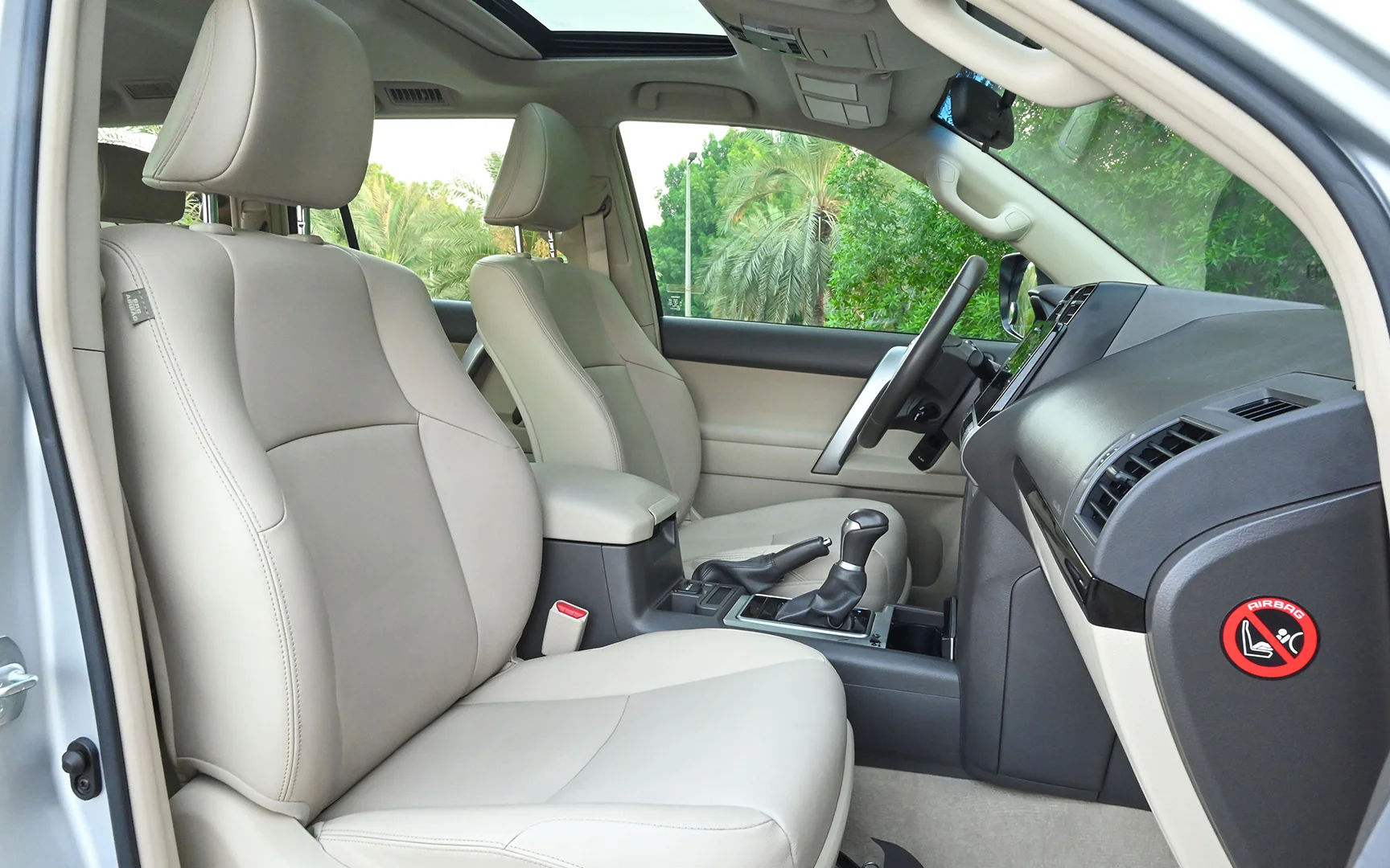 Used 2019 Toyota Prado VXR Silver – Front Passenger Side Cabin View at First Choice Cars Sharjah