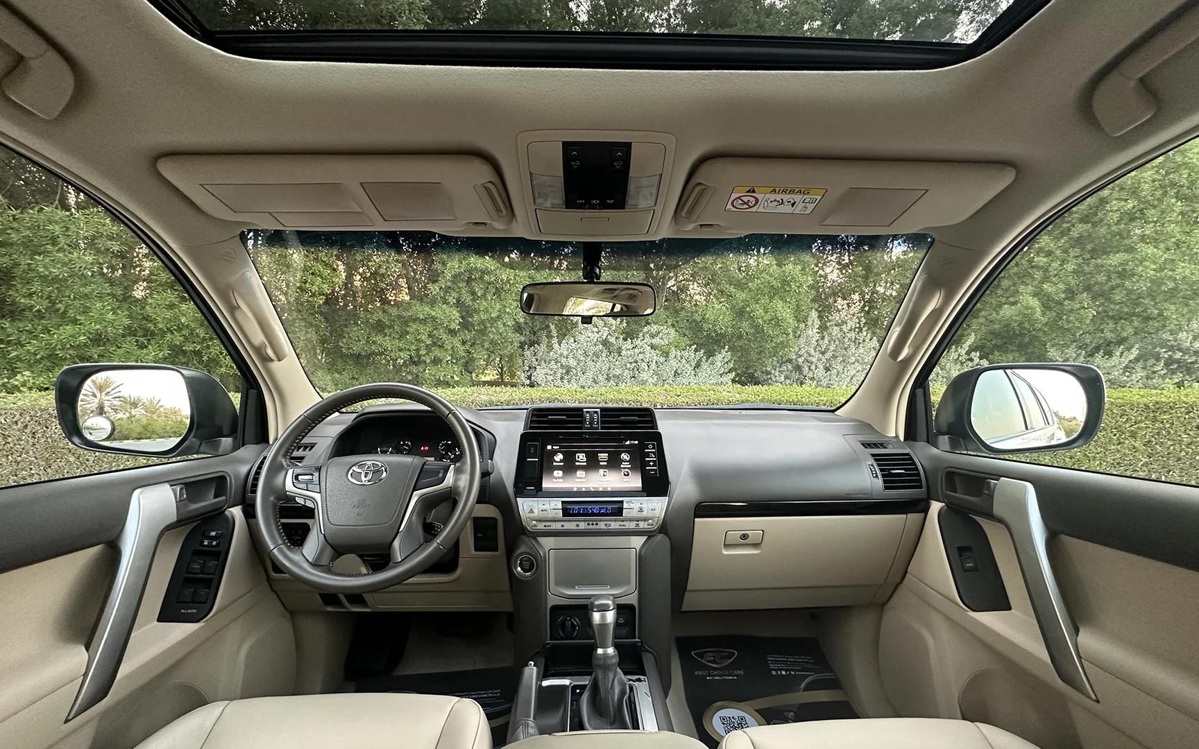 Used 2019 Toyota Prado VXR Silver – Front Cabin / Dashboard Full View at First Choice Cars Sharjah