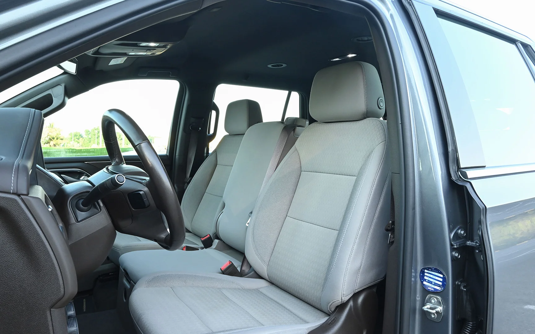 Used 2021 Chevrolet Tahoe LS Silver – Front Driver Side Cabin View at First Choice Cars Sharjah