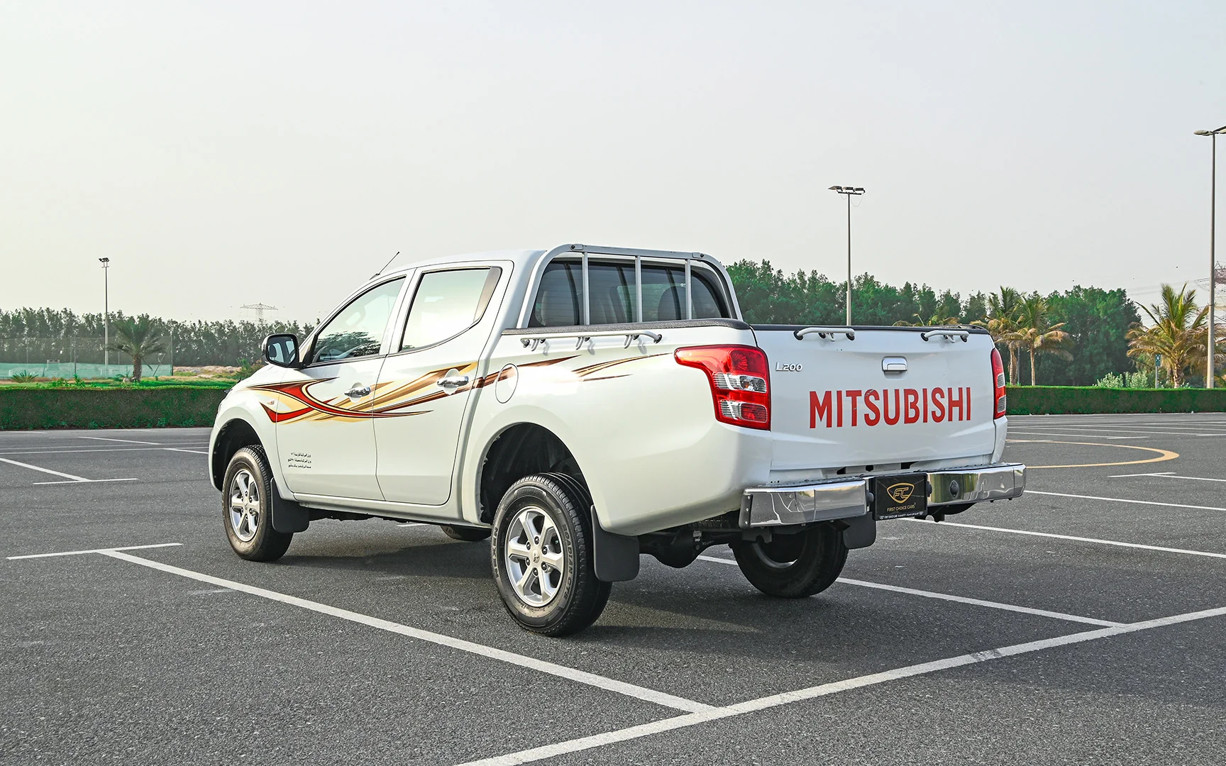 Used 2018 Mitsubishi L200 GLX Double Cabin White – Left Back Diagonal (45°) View at First Choice Cars Sharjah