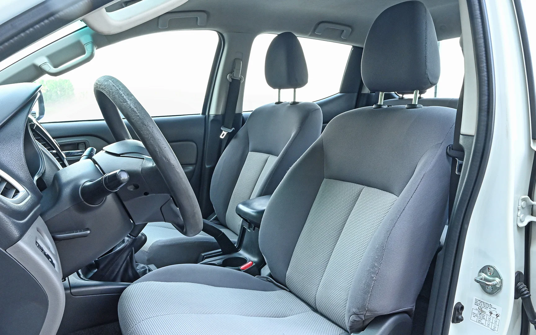 Used 2018 Mitsubishi L200 GLX Double Cabin White – Front Driver Side Cabin View at First Choice Cars Sharjah