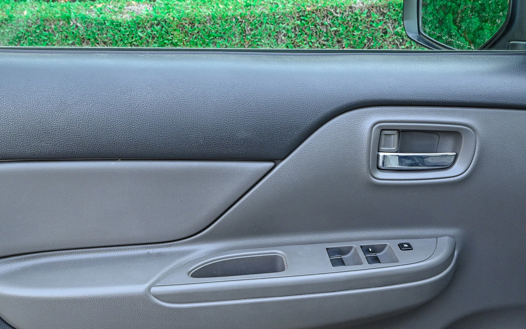 Used 2018 Mitsubishi L200 GLX Double Cabin White – Driver Door Panel Full View at First Choice Cars Sharjah