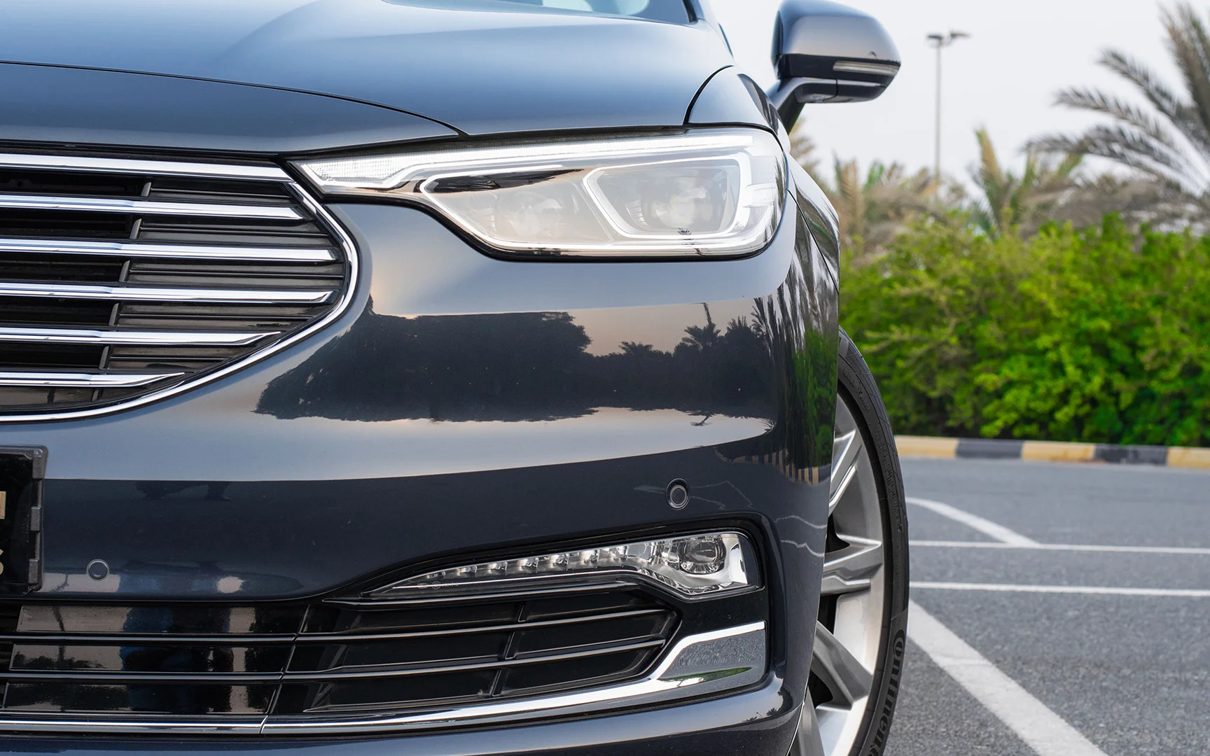 Used 2022 Ford Taurus Titanium Blue – Headlight Close-up at First Choice Cars Sharjah