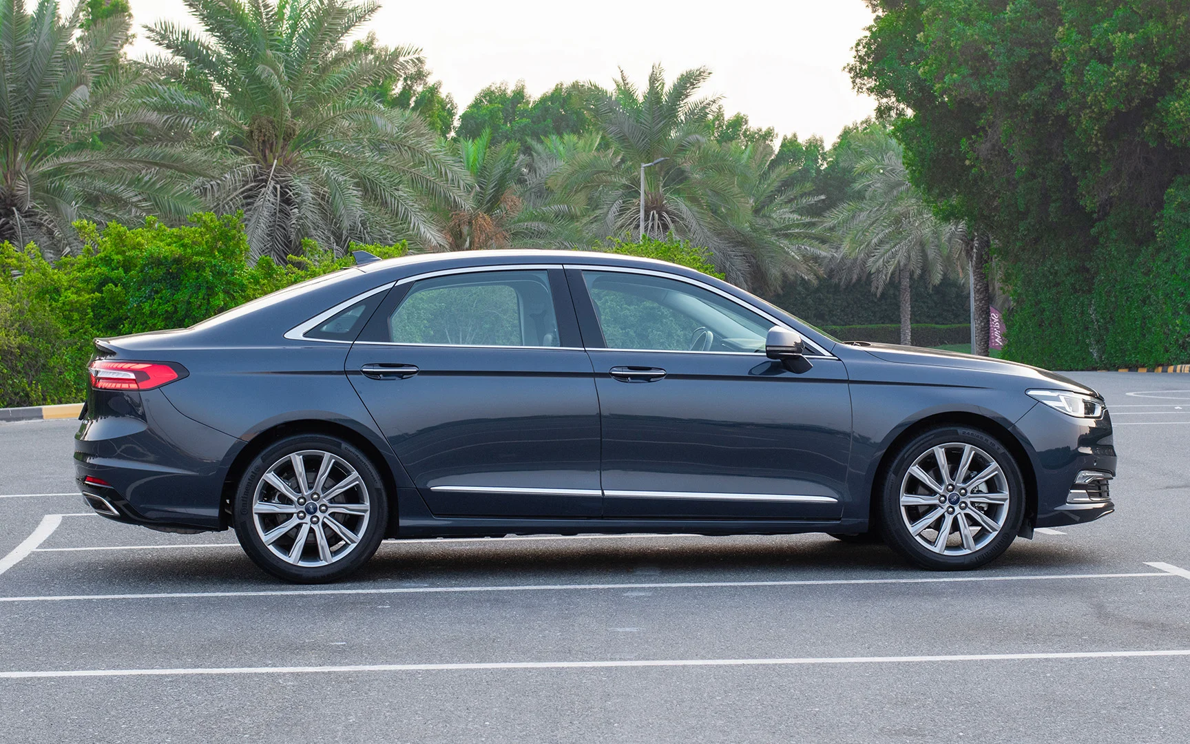 Used 2022 Ford Taurus Titanium Blue – Left Side View at First Choice Cars Sharjah