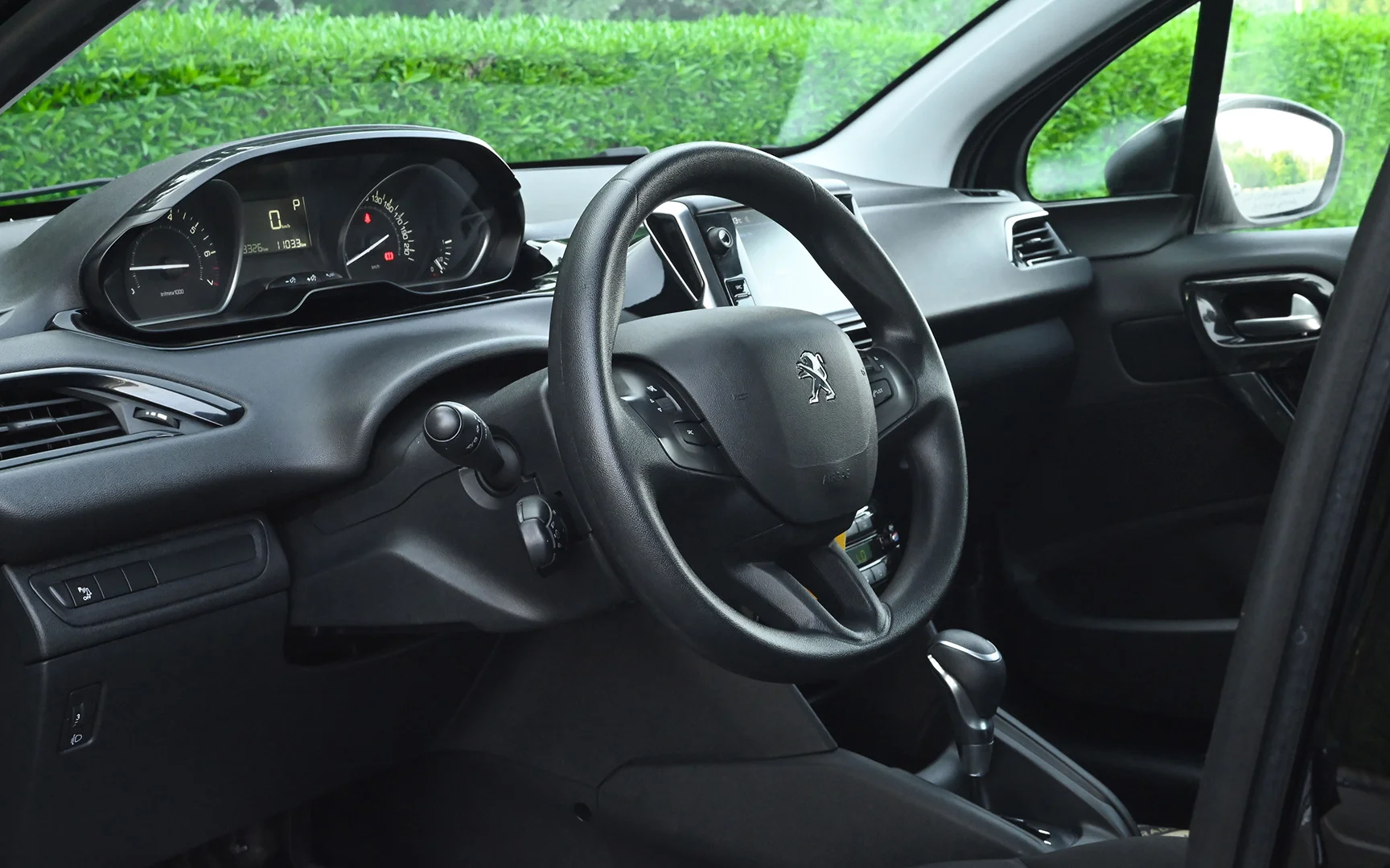 Used 2019 Peugeot 208 Active Black – Driver Side Dashboard & Steering View at First Choice Cars Sharjah