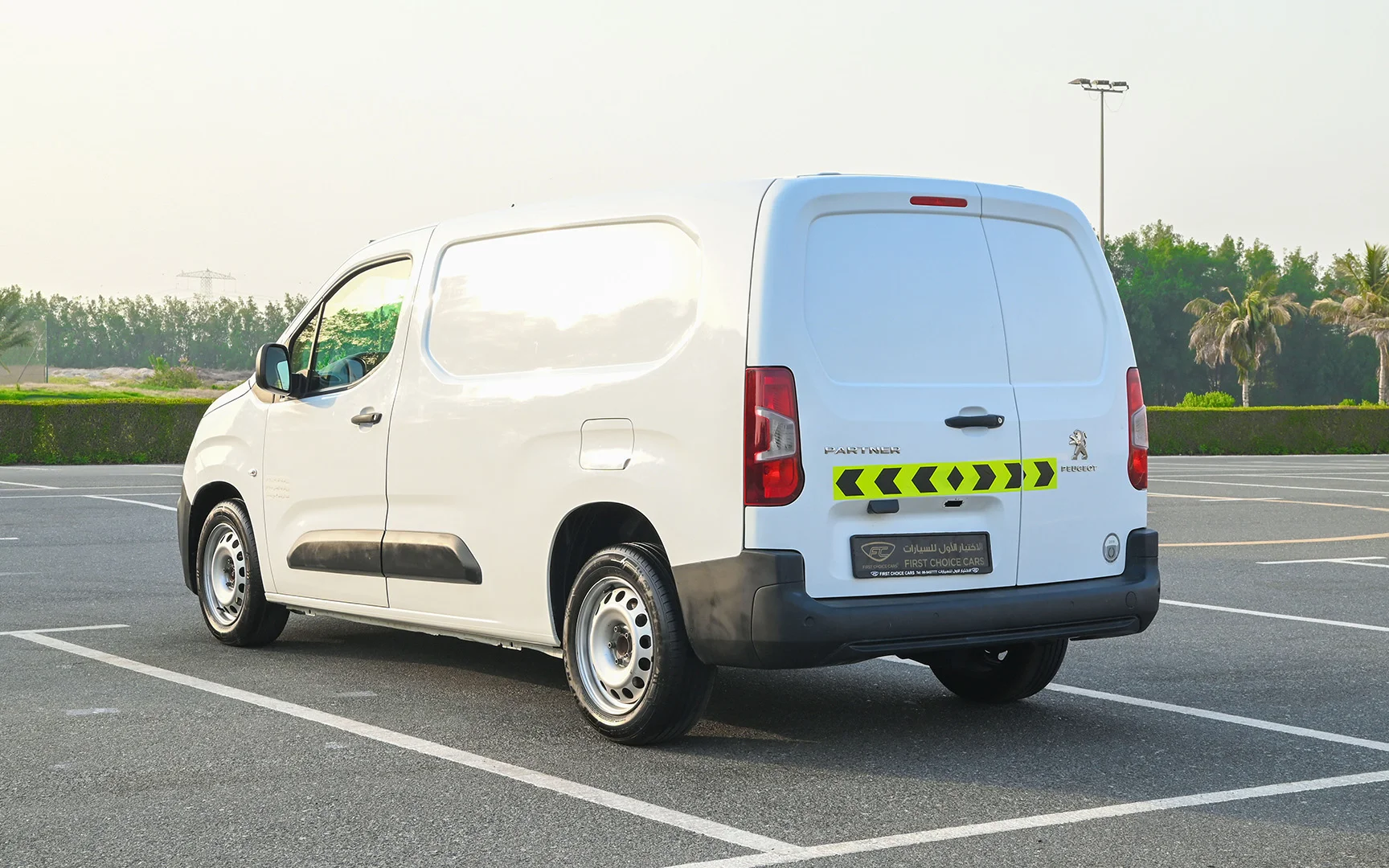 Used 2020 Peugeot Partner Long Van in White – Left Back Diagonal (45°) View for Sale at First Choice Cars Dubai Sharjah