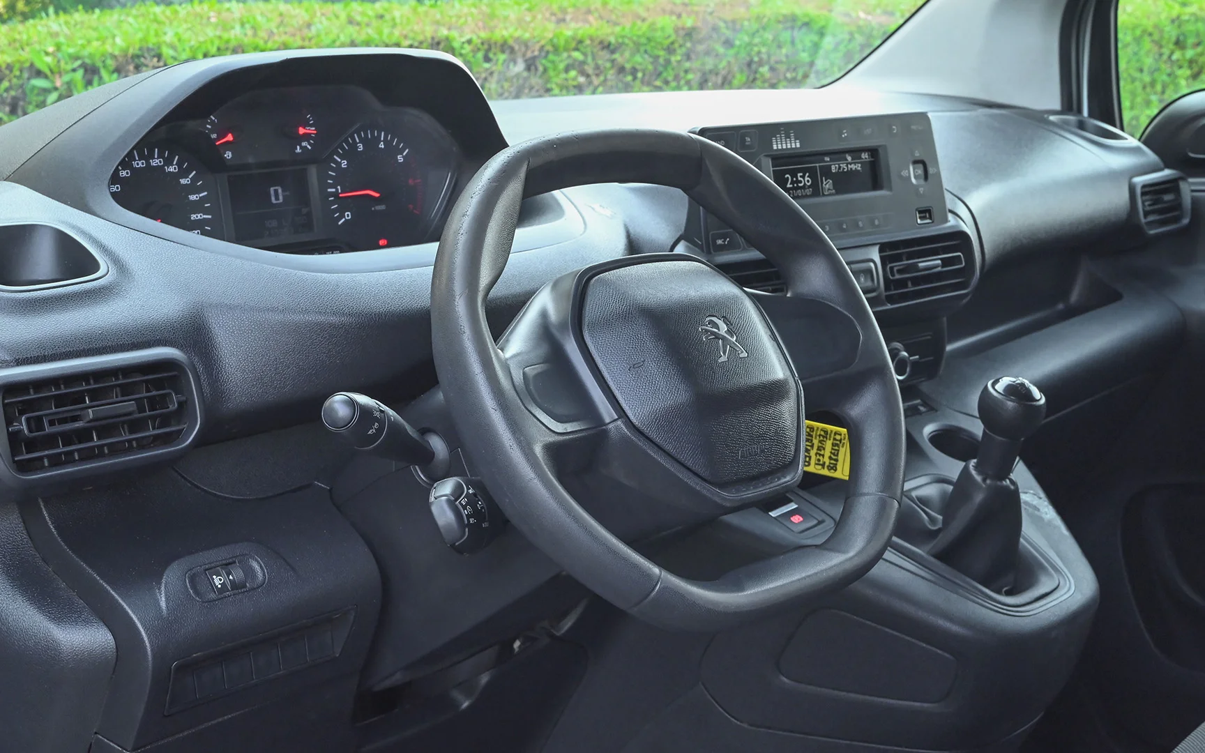 Used 2020 Peugeot Partner Long Van in White – Driver Side Dashboard & Steering View for Sale at First Choice Cars Dubai Sharjah