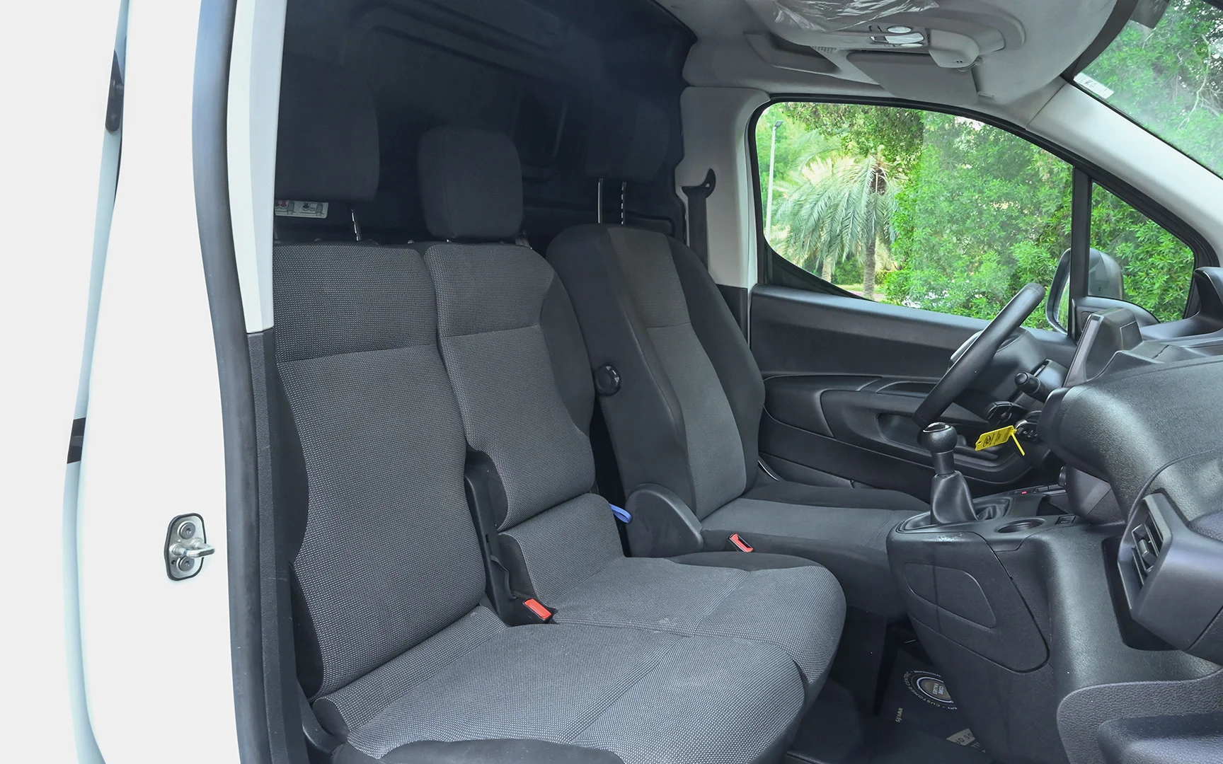 Used 2020 Peugeot Partner Long Van in White – Front Driver Side Cabin View for Sale at First Choice Cars Dubai Sharjah
