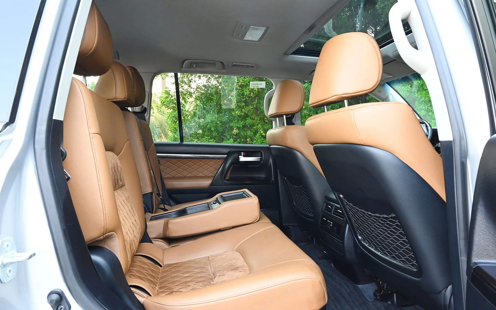 Used 2021 Toyota Land Cruiser GXR Silver – Rear Passenger Side Cabin View at First Choice Cars Sharjah