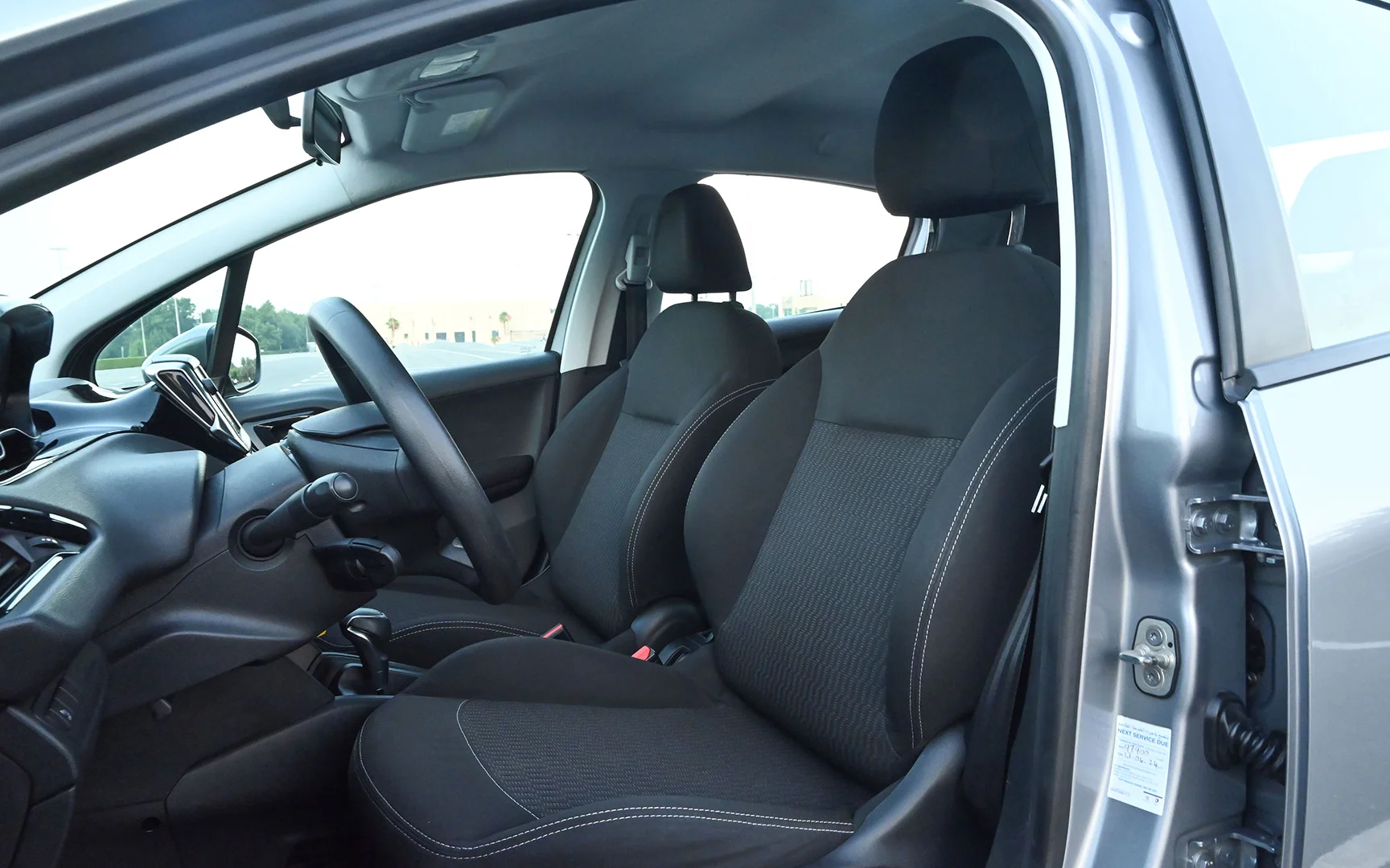 Used 2019 Peugeot 208 Active Silver – Front Driver Side Cabin View at First Choice Cars Sharjah