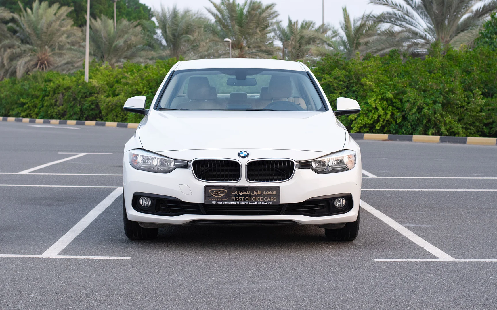 Used 2017 BMW 3-Series 318i White – Front View at First Choice Cars Sharjah