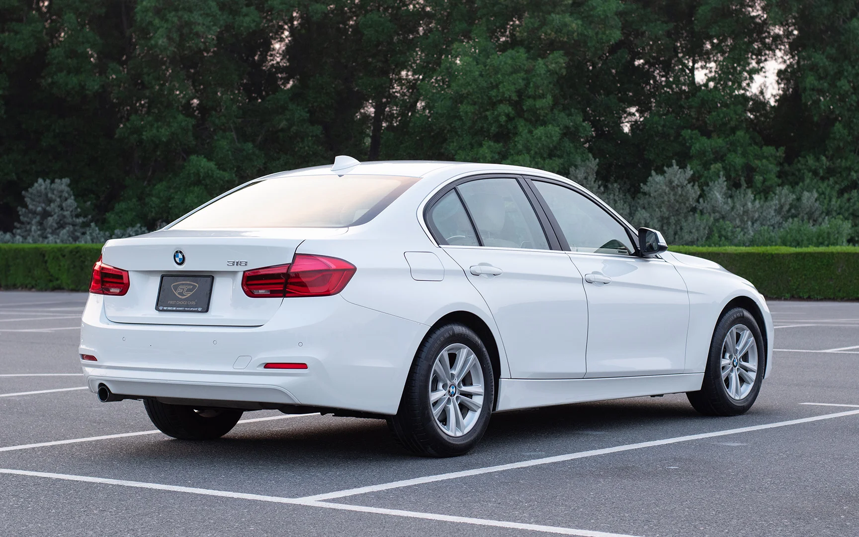 Used 2017 BMW 3-Series 318i White – Left Back Diagonal (45°) View at First Choice Cars Sharjah