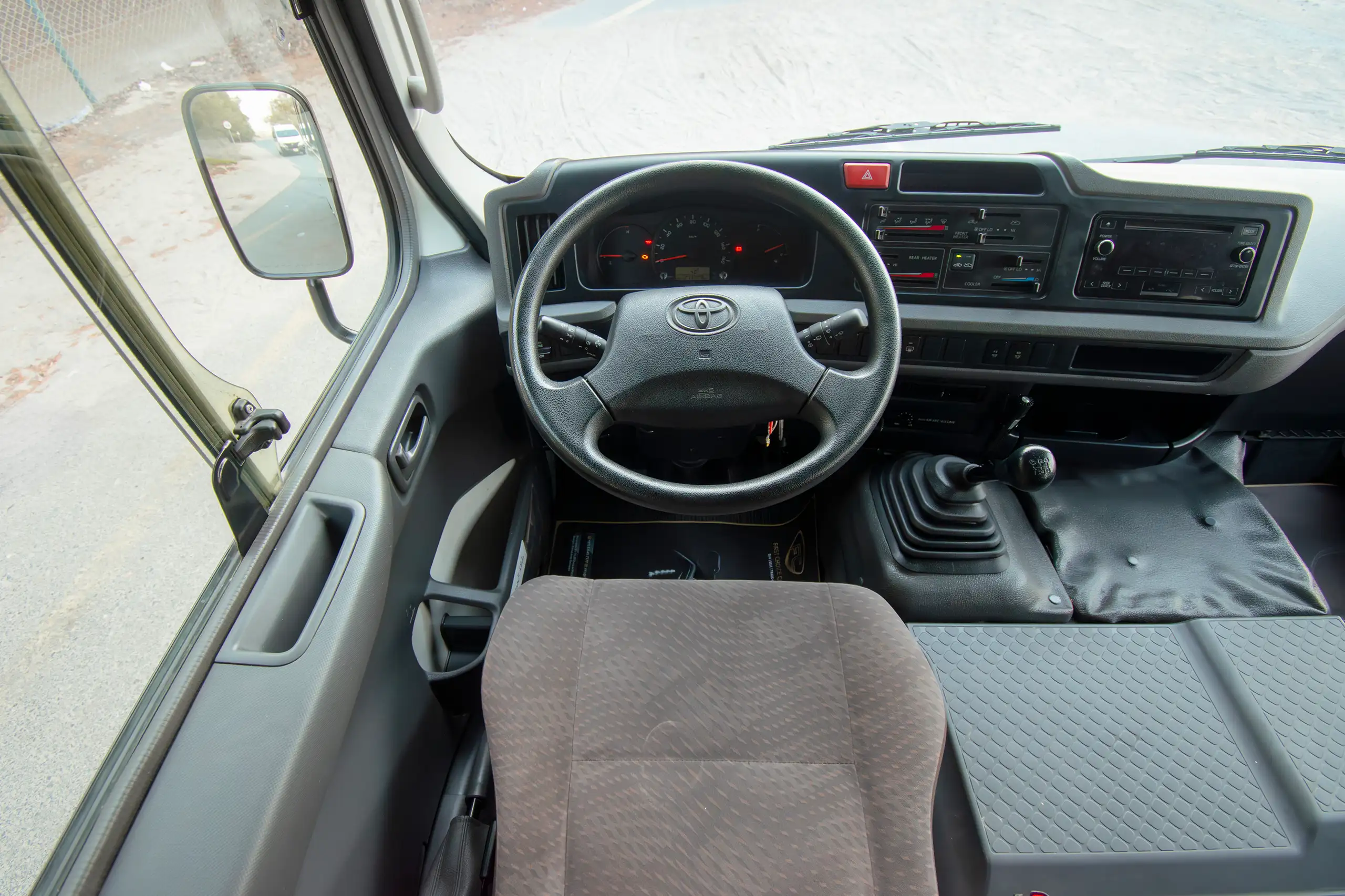 Used 2020 Toyota Coaster High Roof in White – Steering Wheel & Instrument Cluster for Sale at First Choice Cars Dubai Sharjah