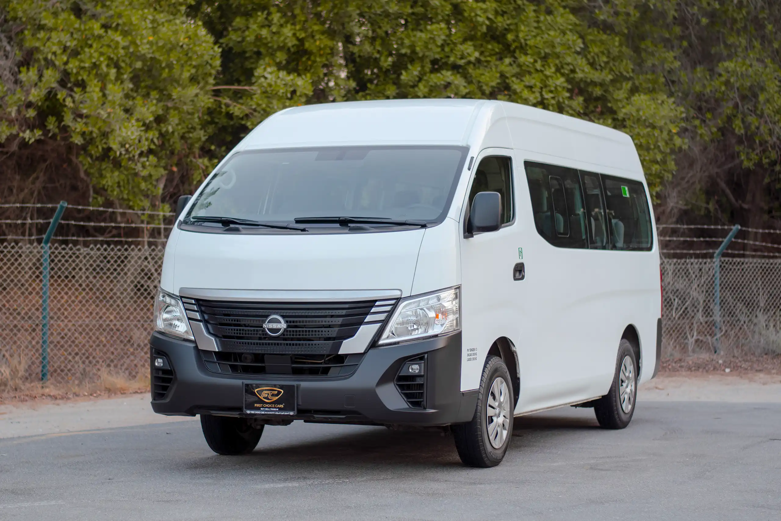 Used 2023 Nissan Urvan High Roof in White – Left Front Diagonal (45°) View for Sale at First Choice Cars Dubai Sharjah